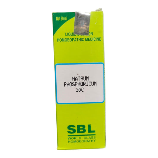 A 30 ml box of SBL Liquid Bismuth Homoeopathic Medicine, Natrum Phosphoricum 30C, featuring a bright lime green and yellow-green design with a white label in the center.