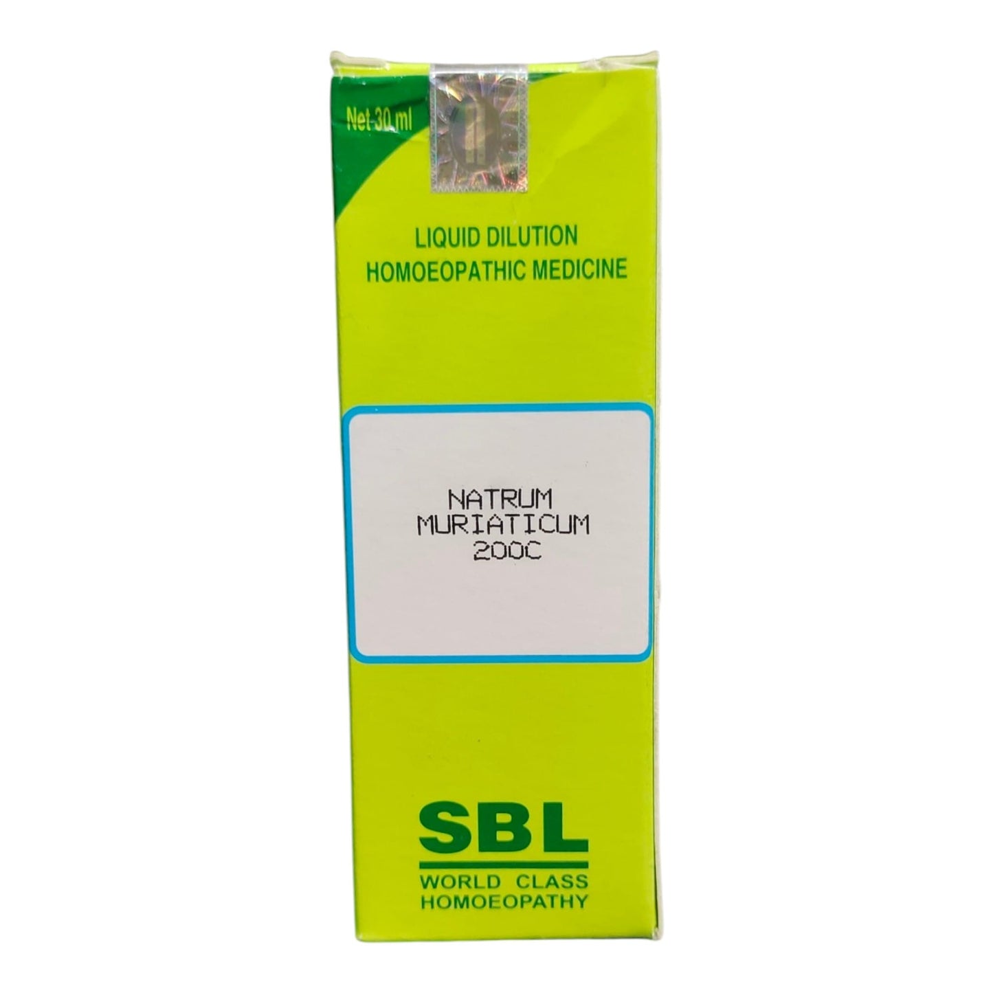 A tall rectangular box of SBL World Class Homoeopathy Liquid Dilution homeopathic medicine, labeled 'Natrum Muriaticum 200C'. The packaging is lime green with dark green text and a white label in the center.