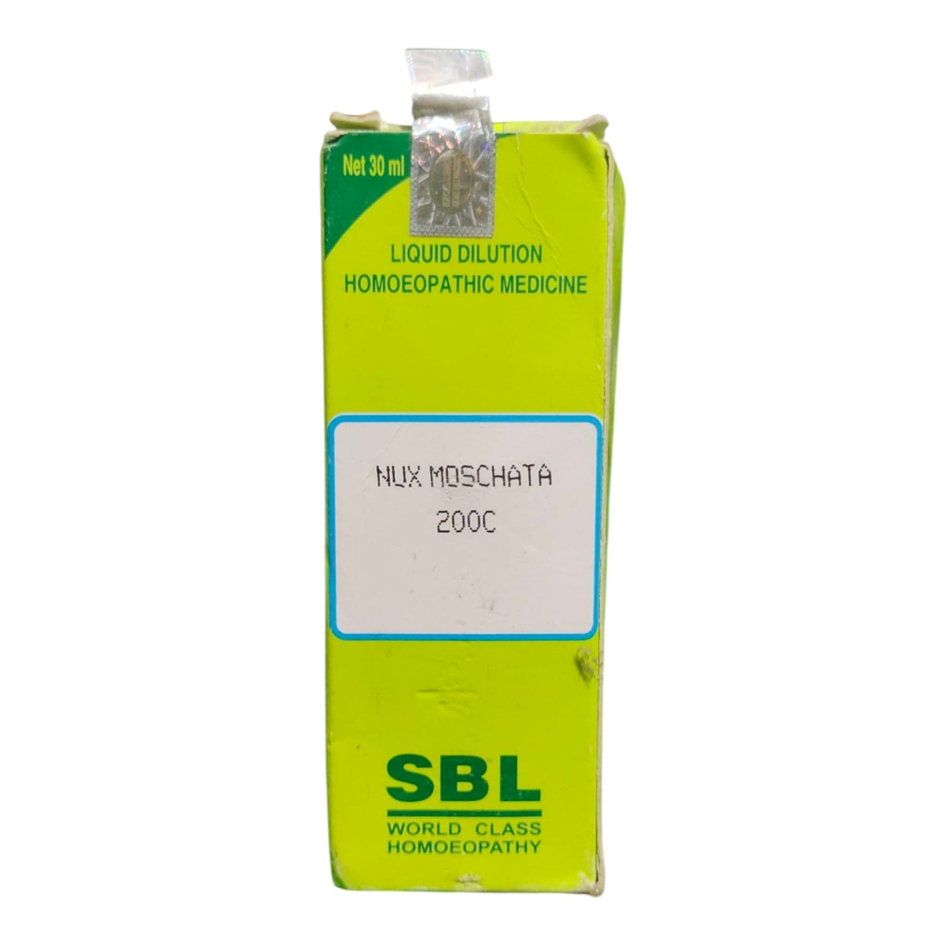 A lime green cardboard box of SBL World Class Homoeopathy Nux Moschata 200C liquid dilution medicine, featuring a white label in the center and a clear plastic seal at the top.