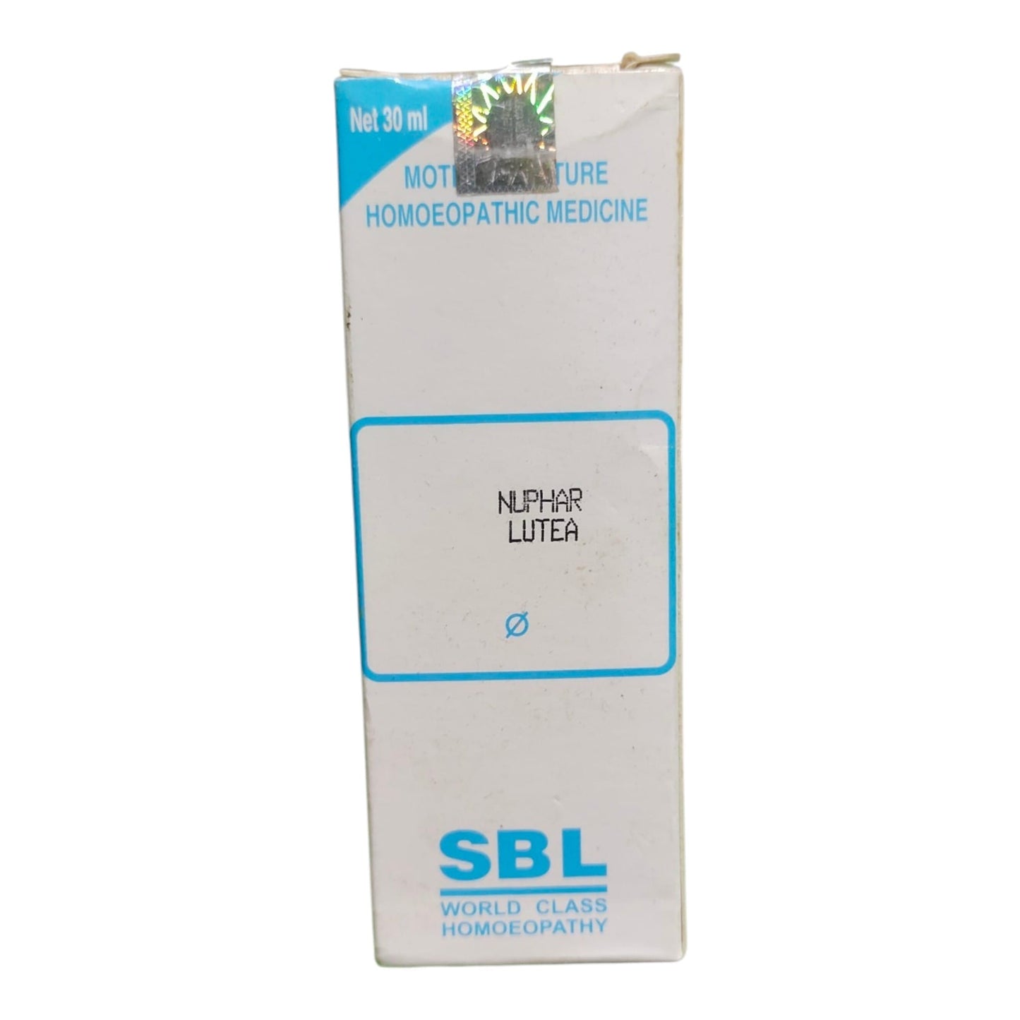 A white cardboard box of SBL Napher Lutea homeopathic medicine, featuring blue text and a blue border on the front label.