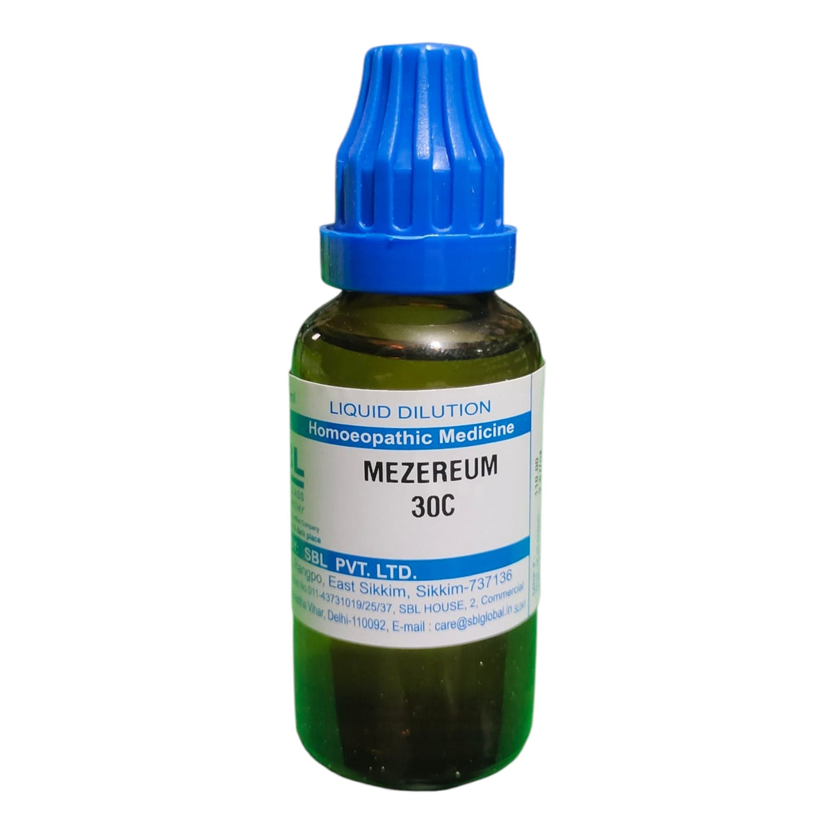 A small amber glass bottle of homeopathic liquid medicine with a blue ribbed cap and a white label reading 'MEZEREUM 30C'.
