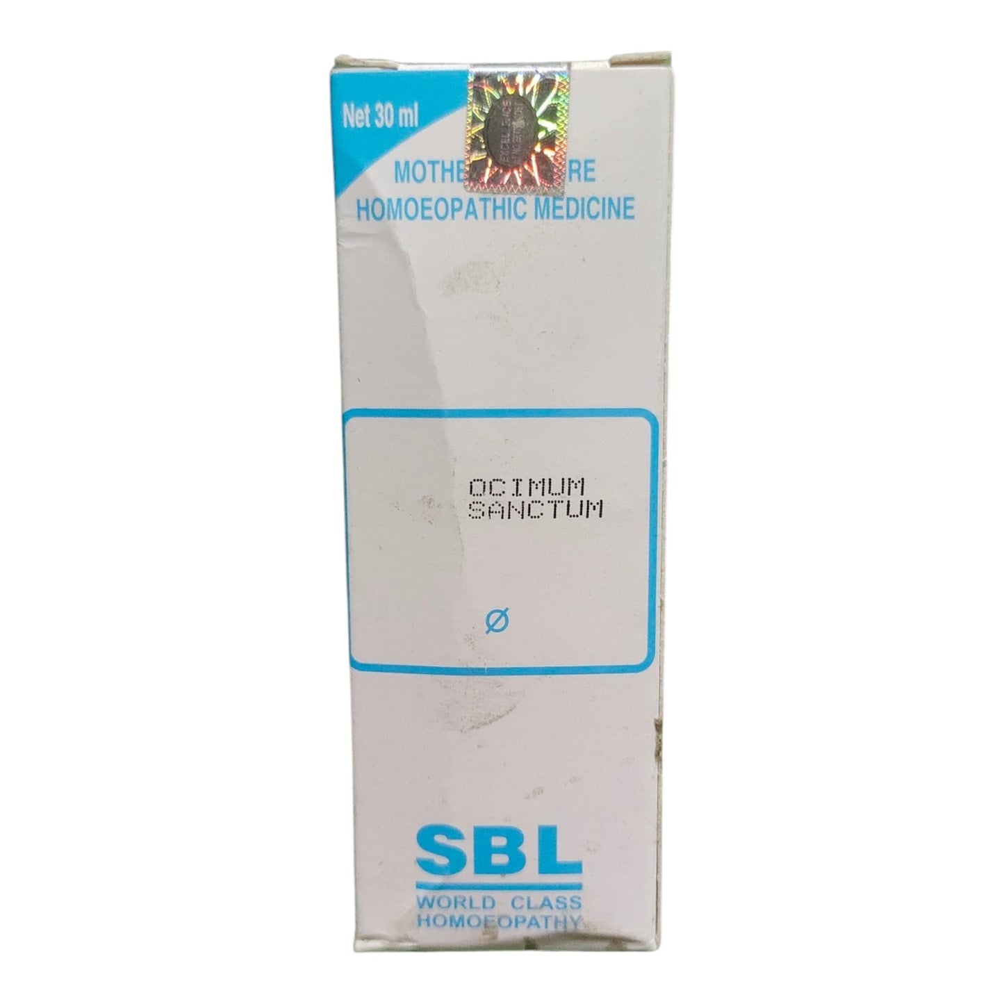 A tall rectangular white box of SBL Mother Love Homeopathic Medicine, featuring blue text and border details, photographed against a plain white background.