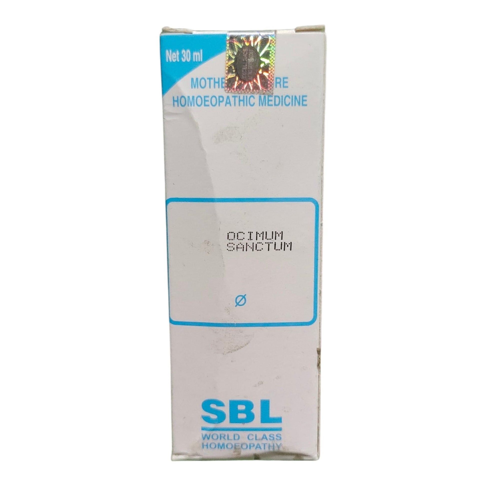 A tall rectangular white box of SBL Mother Love Homeopathic Medicine, featuring blue text and border details, photographed against a plain white background.