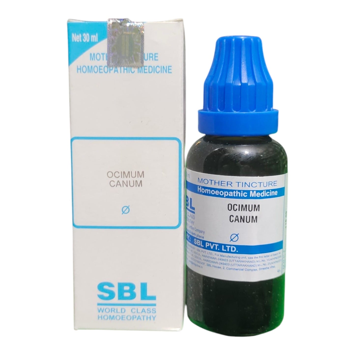 A bottle of SBL Mother Tincture Homoeopathic Medicine next to its white and blue cardboard packaging box, on a plain white background.