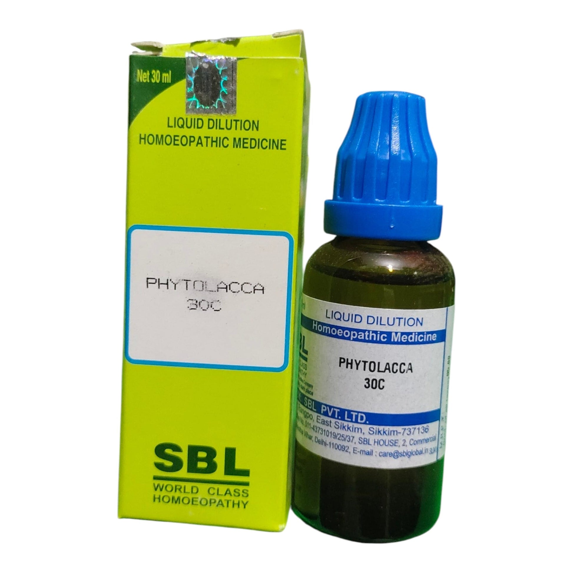 A bottle of SBL Phytolacca 30C liquid dilution homeopathic medicine with a blue cap next to its lime green box, on a white background.