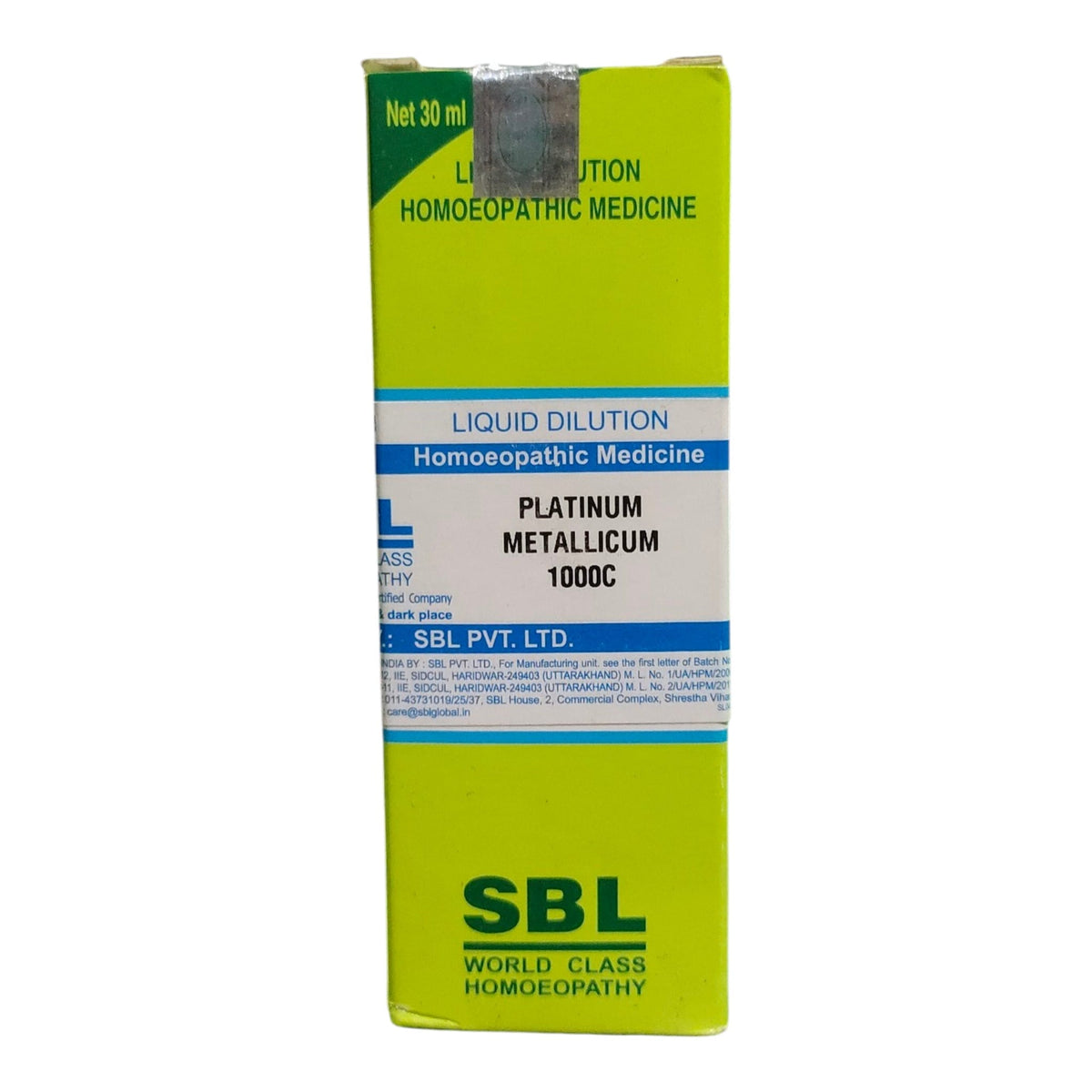 A box of SBL Platinum Metallicum 1000C liquid dilution homeopathic medicine, featuring a bright lime green and white design with blue accents.