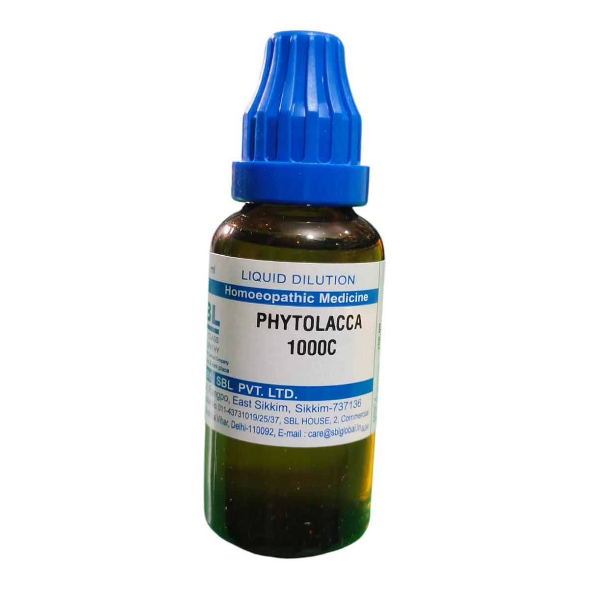 A small amber glass dropper bottle of PHYTOLACCA 1000C liquid dilution homeopathic medicine with a blue cap and white label, on a white background.