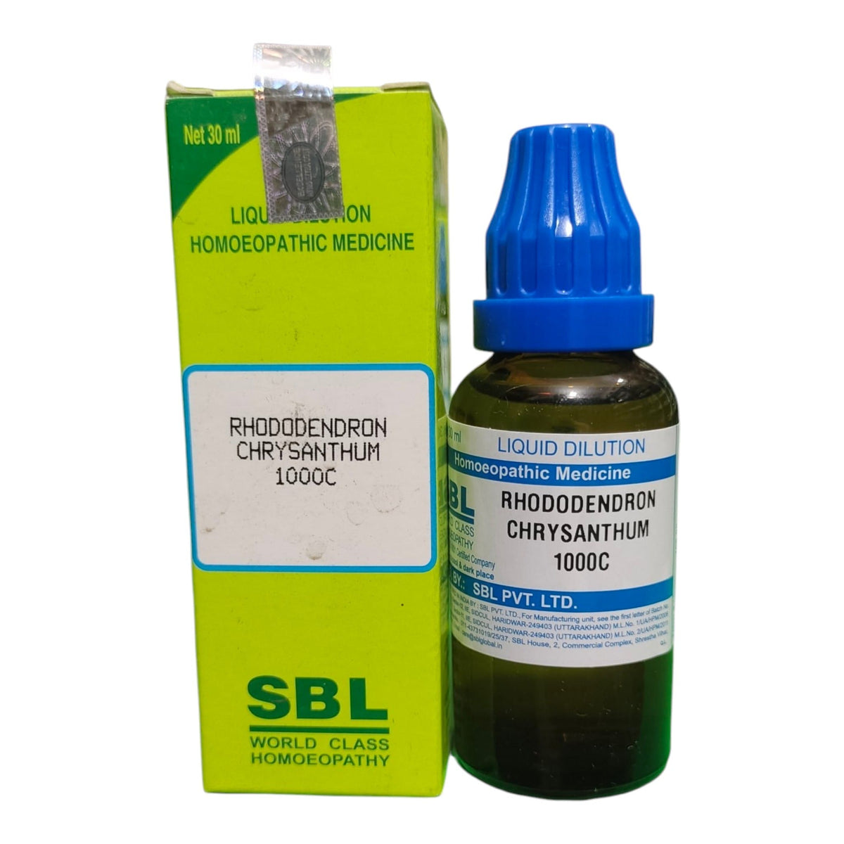 A bottle of SBL Rhododendron Chrysanthum 1000C liquid dilution homeopathic medicine next to its lime green box, on a white background.