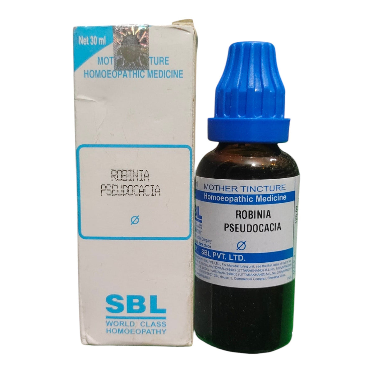 A bottle of SBL World Class Homoeopathy Robinia Pseudocacia Mother Tincture next to its white cardboard packaging box on a white background.