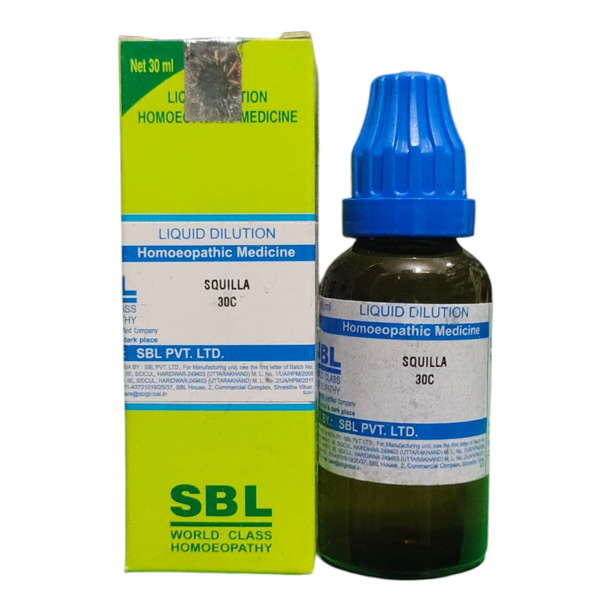 A bottle of SBL Liquid Dilution Homeopathic Medicine (Squilla 30C) with a blue dropper cap next to its lime green and white packaging box.