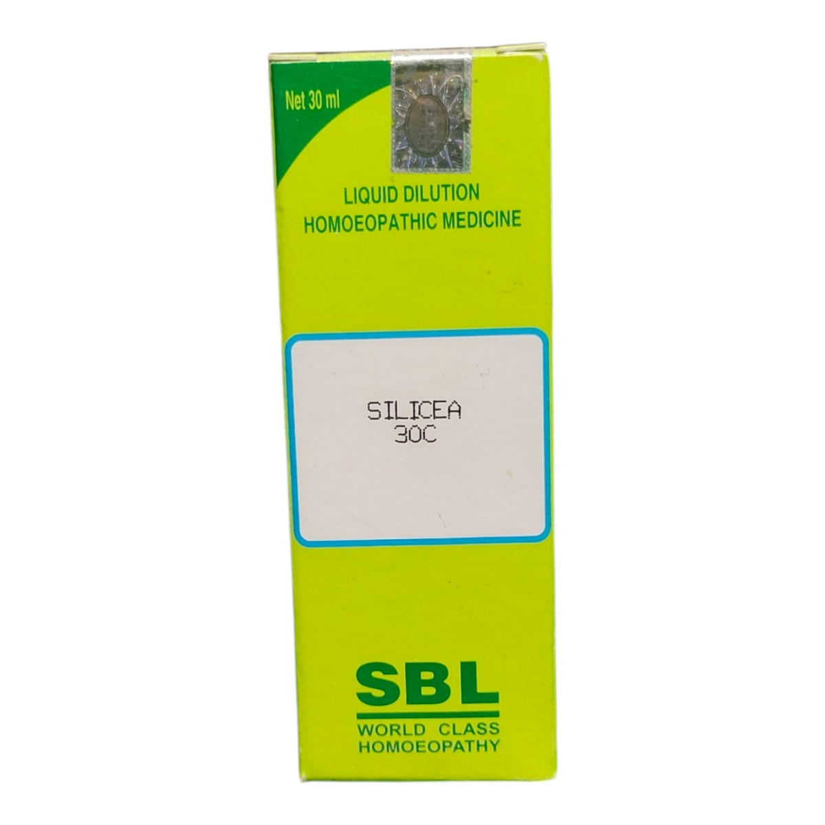 A bright lime green box of SBL World Class Homoeopathy Liquid Dilution Silicea 30C homeopathic medicine, shown against a plain white background.
