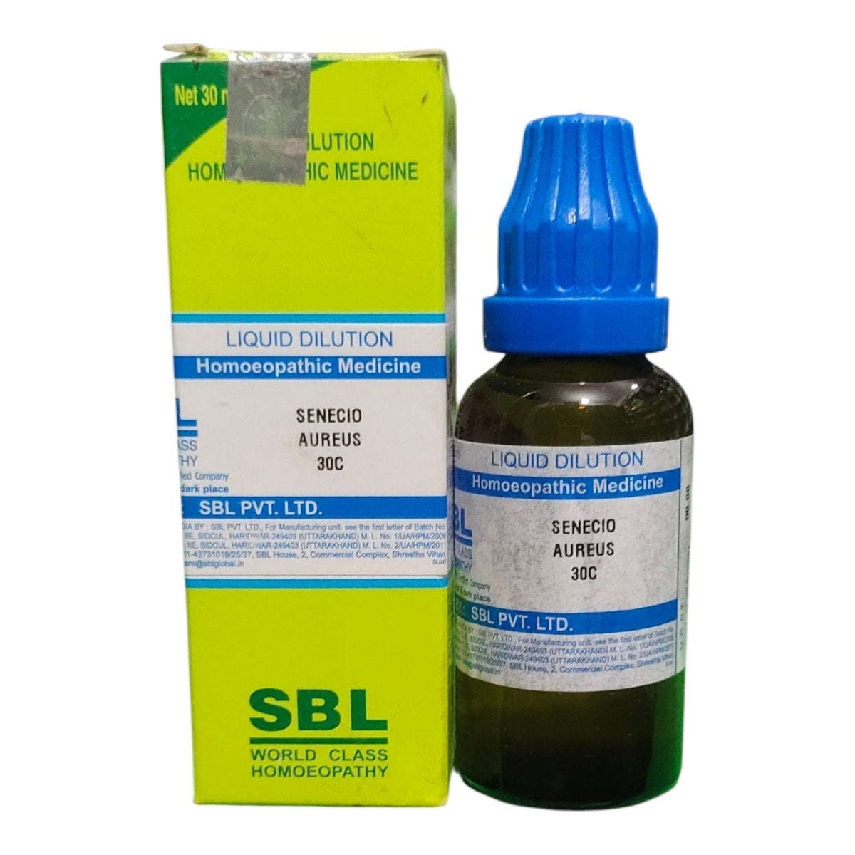 A bottle of SBL Liquid Dilution Homeopathic Medicine (Senecio Aureus 30C) with a blue dropper cap next to its lime green and white cardboard packaging box.