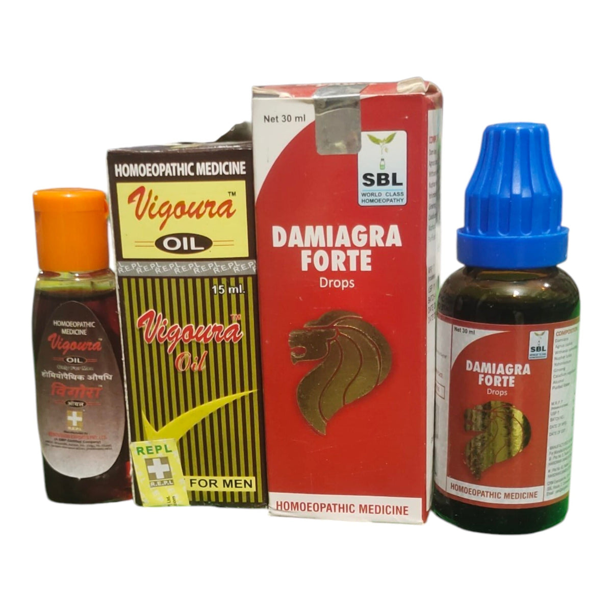 Two bottles and two boxes of homeopathic medicine for men, including Vigoura Oil and Damiagra Forte Drops, displayed against a plain white background.