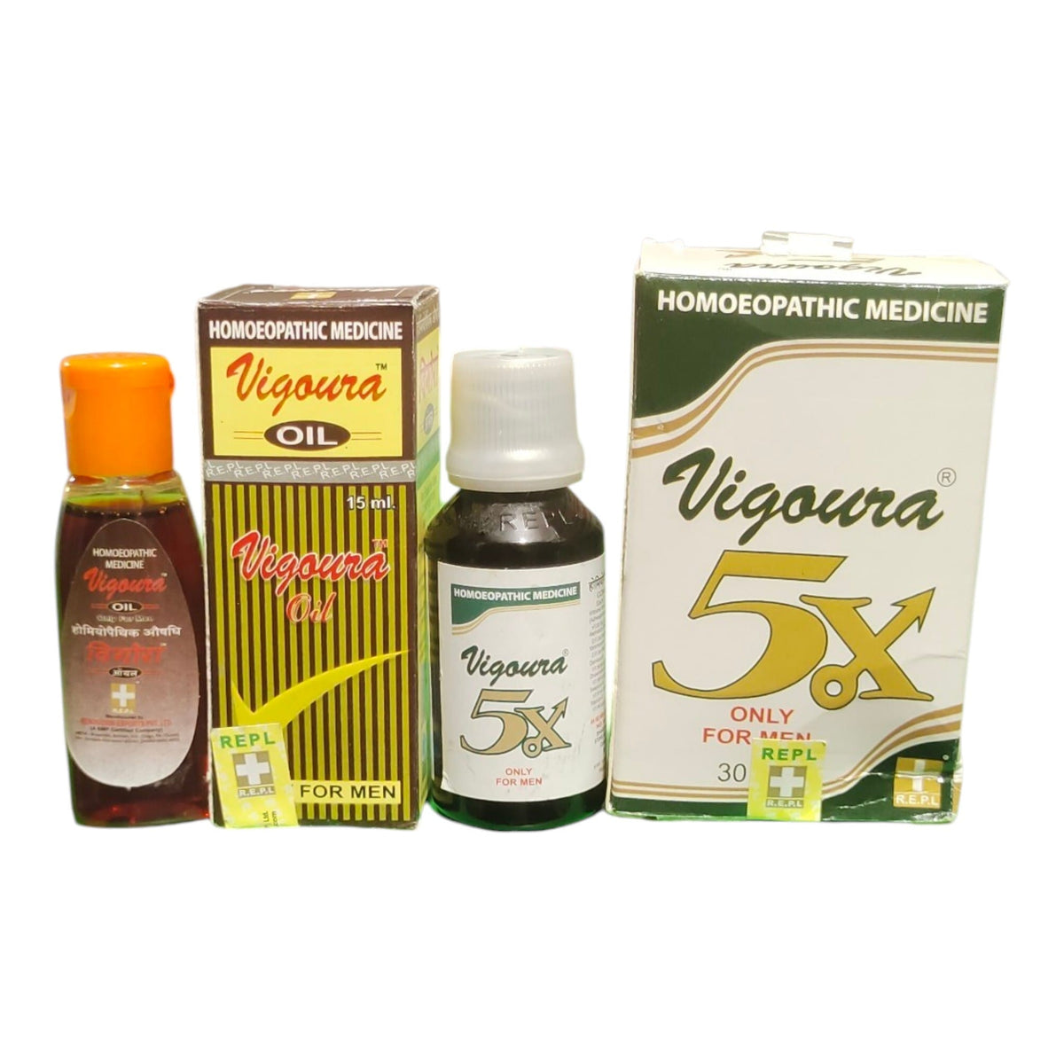 Two bottles and two boxes of Vigoura 5X and Vigoura Oil homeopathic medicines arranged on a plain white background.