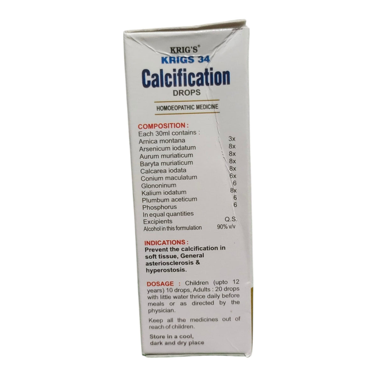 A tall white cardboard box of Krig's Krigs 34 Calcification Drops homeopathic medicine, shown against a plain white background.