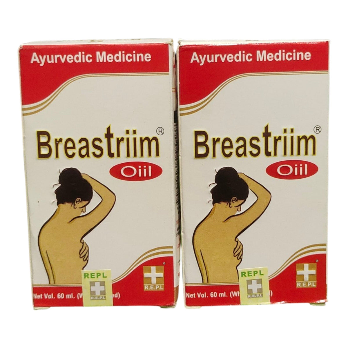 Two boxes of Breastrim Oil Ayurvedic Medicine side by side on a white background. The packaging features a cream-colored center with a red top and bottom banner, gold lettering for the brand name, and an illustration of a woman in a gold-toned figure drawing style.