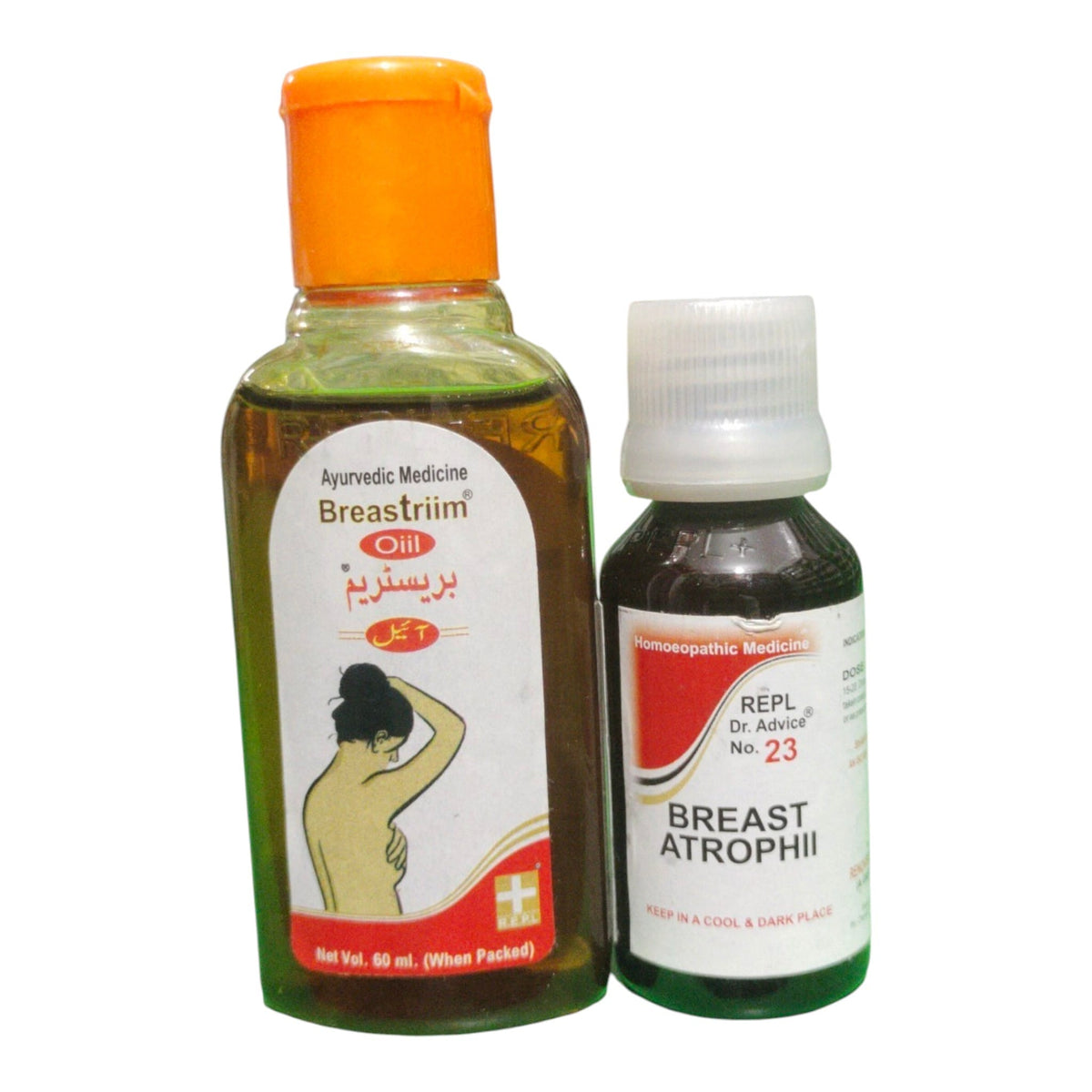 Two bottles of breast health ayurvedic/homeopathic medicine on a white background: a larger Breastriim oil bottle with an orange cap and a smaller Breast Atrophii bottle with a white cap.