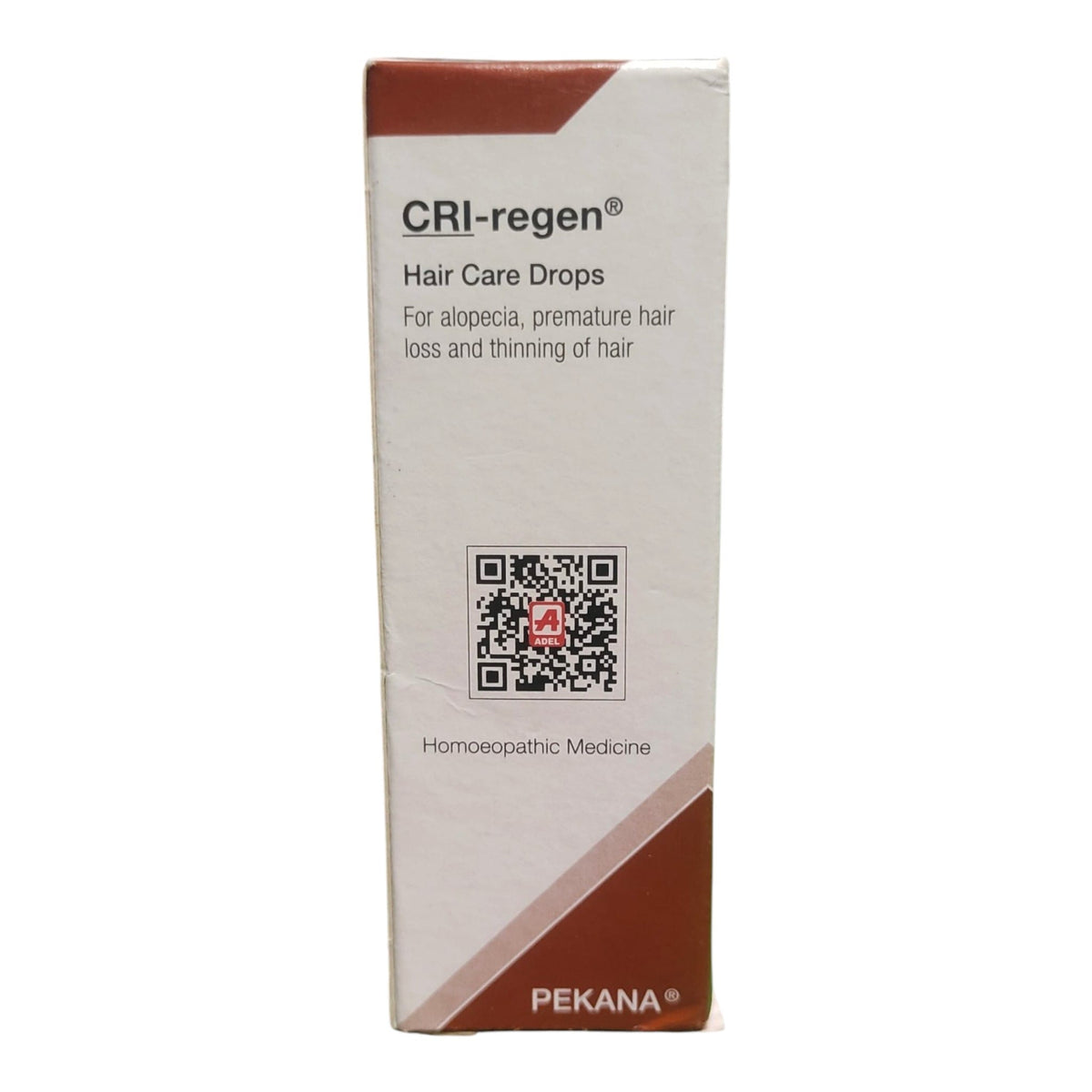 A tall rectangular box of CRI-regen Hair Care Drops by PEKANA, featuring a white background with brown corner accents and black text.