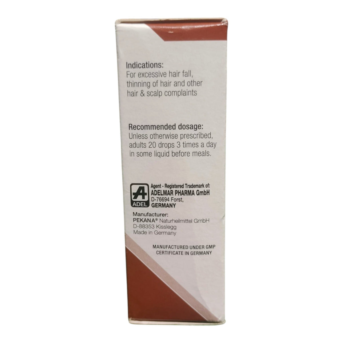 A tall rectangular product box shown upright against a plain white background. The box is mostly white with brown bands near the top and bottom and black printed text detailing indications, dosage, and manufacturer information for ADELMAR PHARMA GmbH.