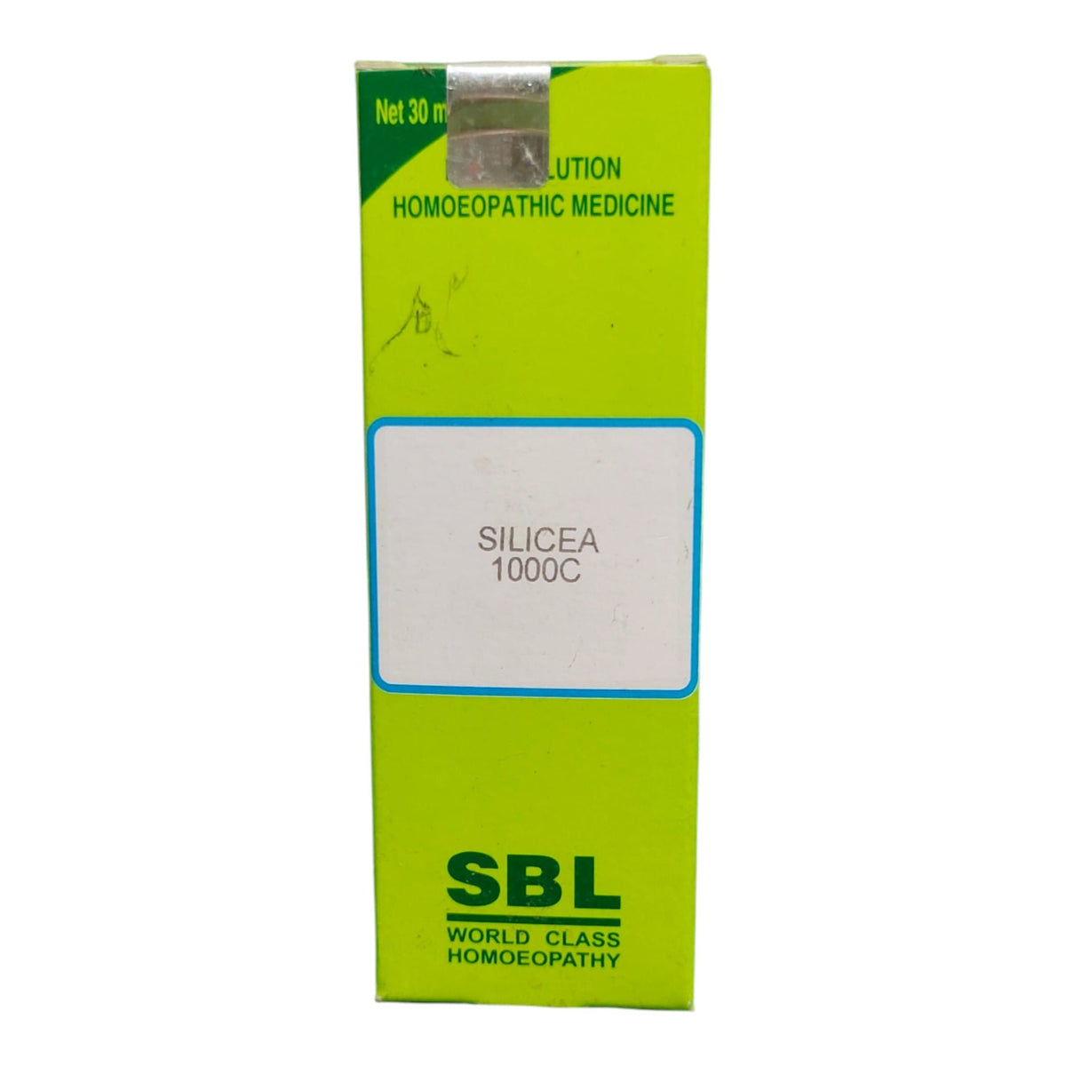 A tall lime green cardboard box of SBL Silicea 1000C homeopathic medicine, featuring a white label in the center and dark green text, set against a plain white background.