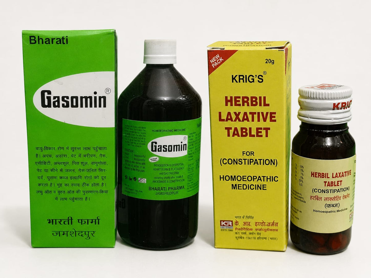 Bharati Gasomin herbal laxative medicine set, including a green box, a dark bottle with a white cap and green label, a yellow Krig's Herbal Laxative Tablet box, and a small amber bottle with a white cap and yellow label.