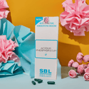 SBL Acidum Phosphoricum homeopathic medicine packaging with pink flowers on a yellow background