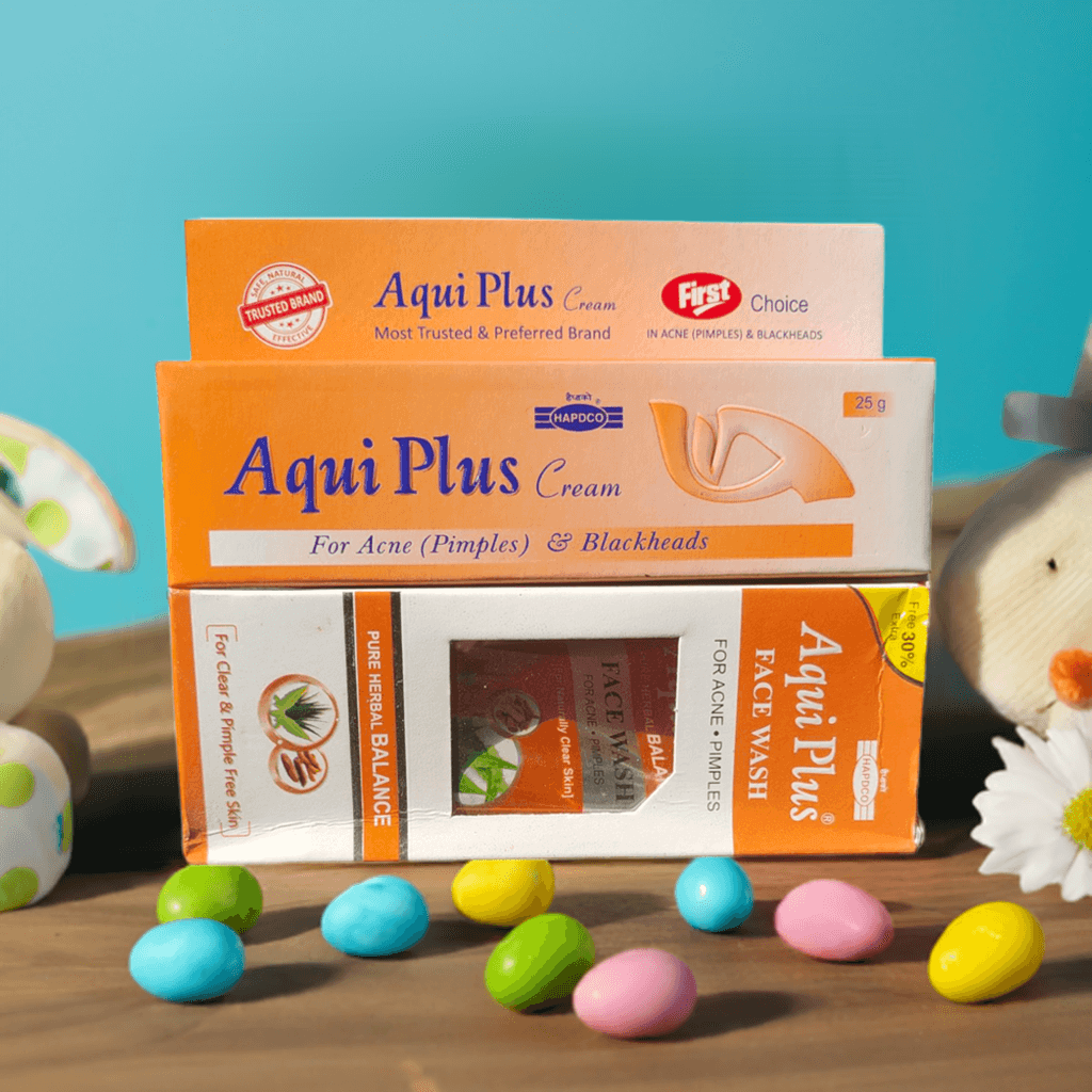 Aqui Plus cream and face wash boxes with colorful candies on a wooden surface and blue background