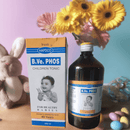 B.Ve. PHOS Children Tonic bottle and box with flowers and a toy in the background
