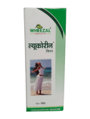 Wheezal homeopathic medicine syrup packaging with a person on a beach
