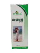 Wheezal Leucorine Syrup packaging with a beach scene on a white background